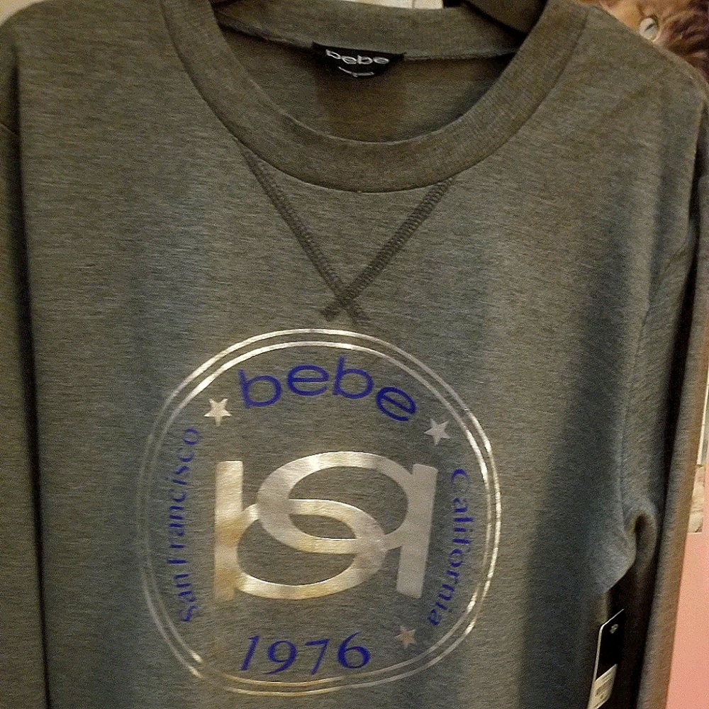 Bebe long sleeve Top sz. M